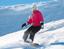 snowboarder riding off piste